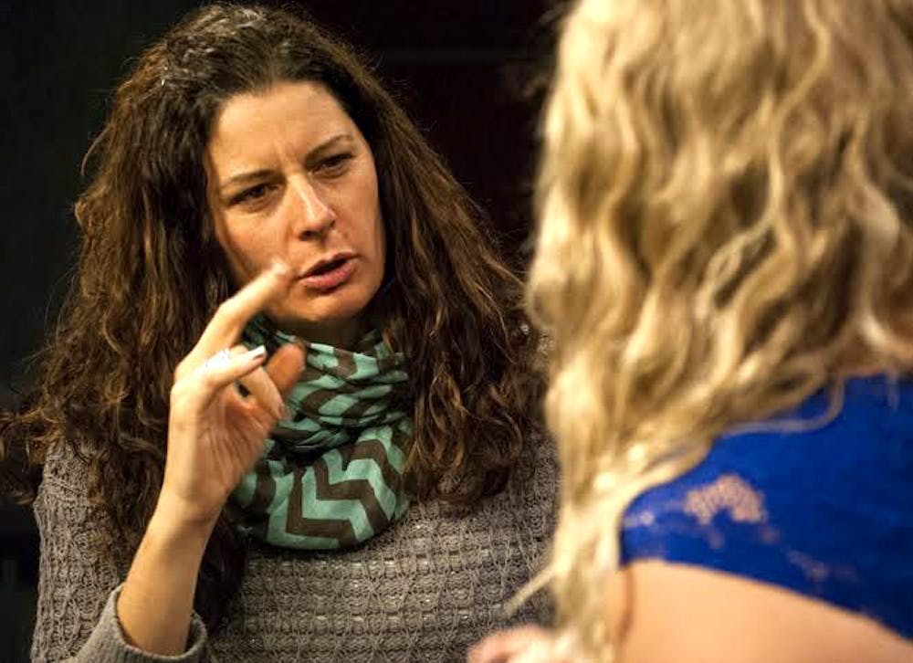 Peyton Gallovich and Dyan Sue Kovacs sign to each other at the Walter Cronkite School. Gallovich and Kovacs have been working together to start the Deaf and Hearing Network, which will air in January. (Photo by Murphy Bannerman)
