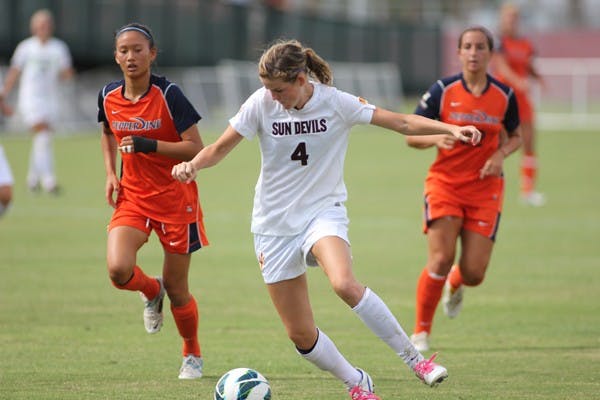 Junior forward Devin Marshall (4) takes the ball downfield during the Sun Devils’ 1-0 upset over Pepperdine on Sept. 9. (Photo by Kyle Newman)
