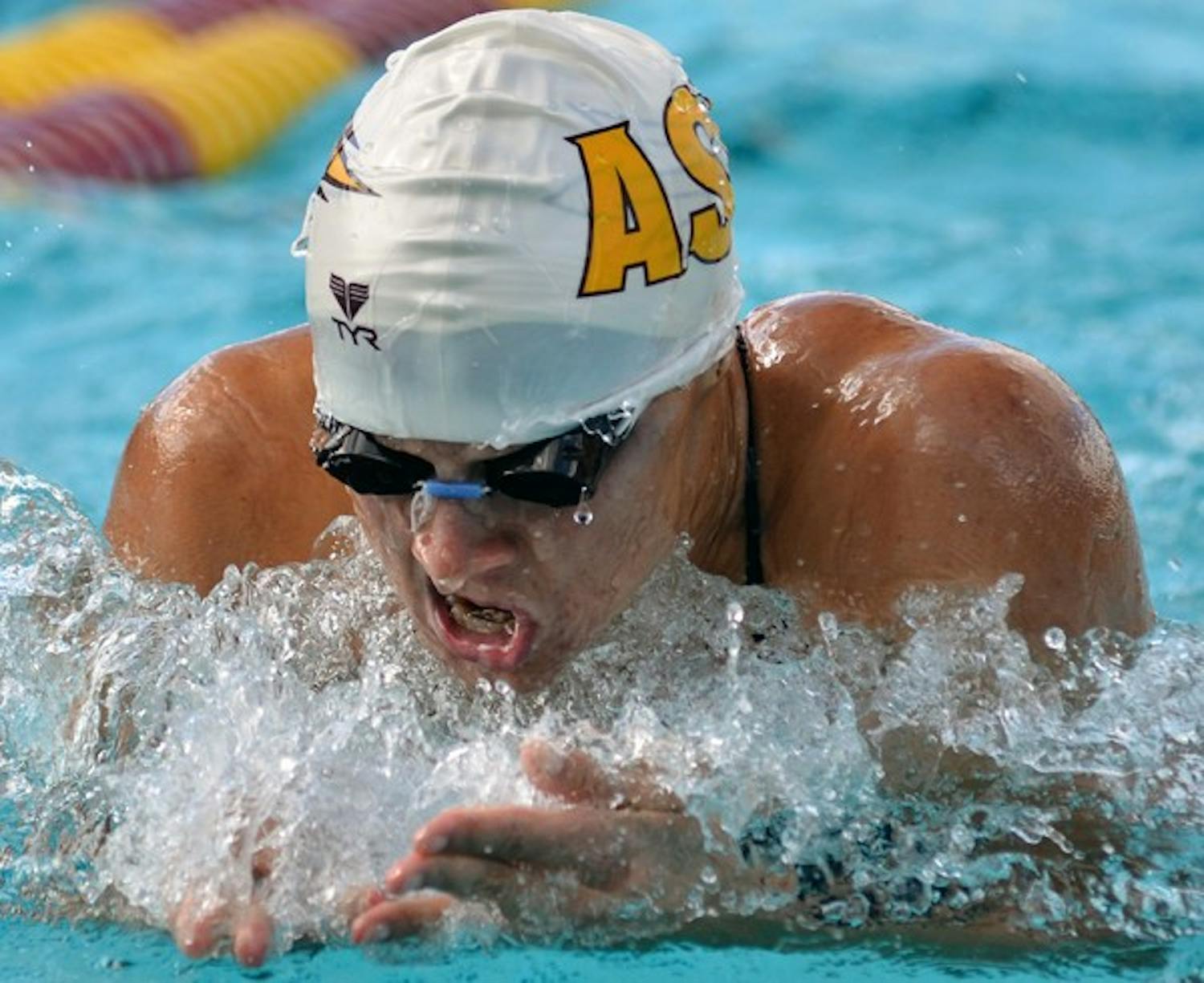 Rebecca Ejdervik competes in a meet against Wisconsin on Nov. 5, 2011. Ejdervik won the 100-meter breaststroke event against Cal on Saturday. (Photo by Aaron Lavinsky)