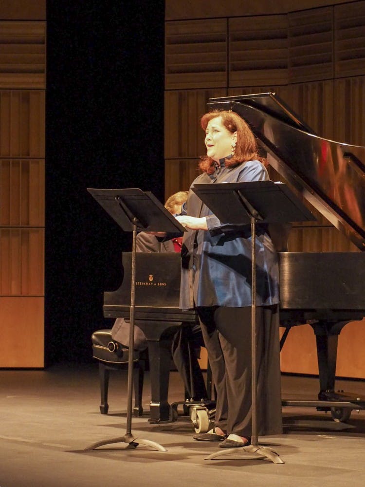 Soprano Carole FitzPatrick performs Ottorino Respighi's "Le repose en Egypte" Monday at the Scottsdale Center for the Performing Arts, Virginia Piper Theater. The concert was the first of the 2015 "ASU Concerts at the Center," which showcases the accomplished faculty and students of ASU's Herberger Institute's School of Music. (J. Bauer-Leffler/The State Press)