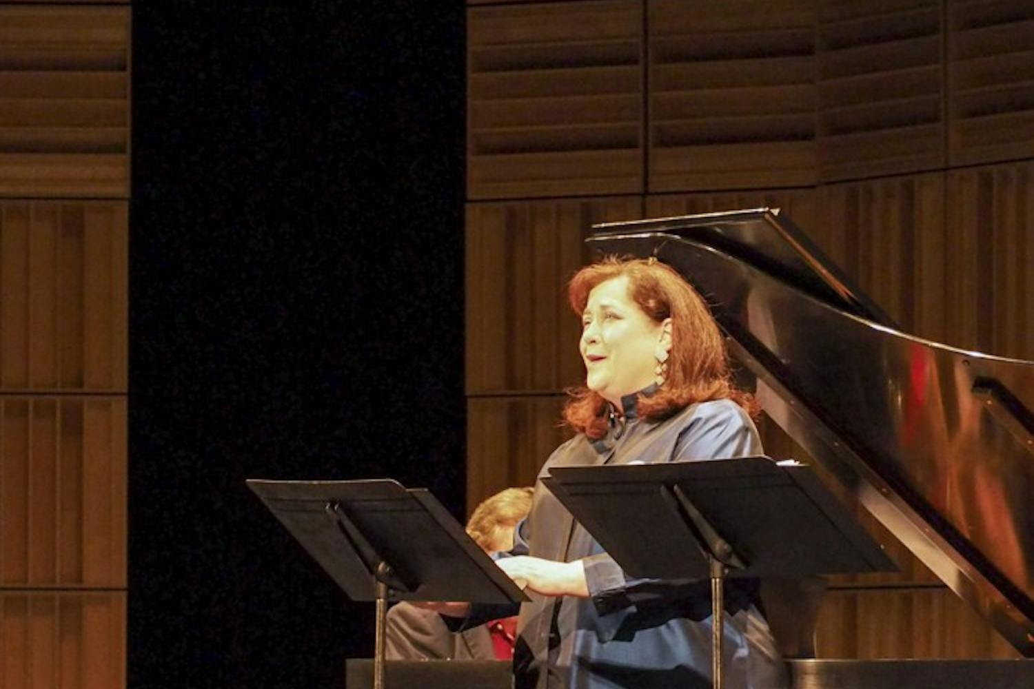 Soprano Carole FitzPatrick performs Ottorino Respighi's "Le repose en Egypte" Monday at the Scottsdale Center for the Performing Arts, Virginia Piper Theater. The concert was the first of the 2015 "ASU Concerts at the Center," which showcases the accomplished faculty and students of ASU's Herberger Institute's School of Music. (J. Bauer-Leffler/The State Press)