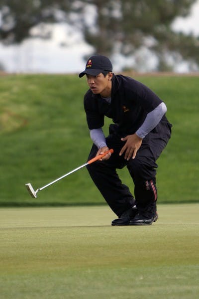 Up in the Air: ASU sophomore Jin Song lines up a putt during the ASU Thunderbird Invitational on April 9 in Tempe. The Pac-10 Championships, which begin on Friday, has no clear favorite for the 2011 title. (Photo by Scott Stuk)