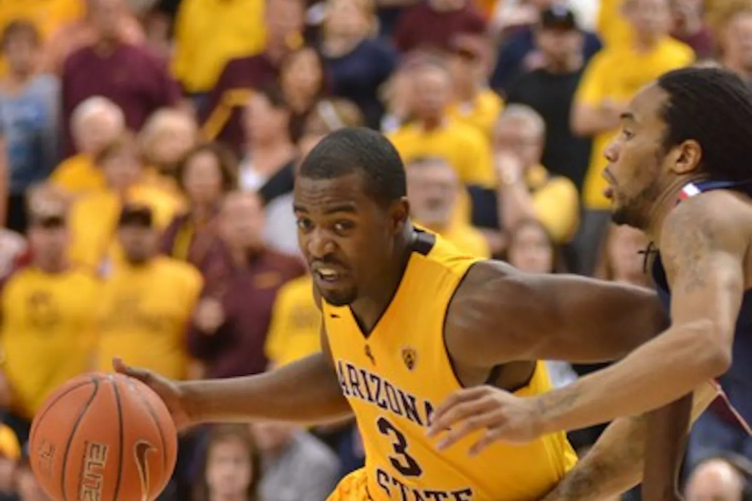 Remaining Upbeat: ASU senior guard Ty Abbott tries to drive inside during the Sun Devils’ 67-52 loss to UA on Sunday. Despite the team’s poor Pac-10 record, Abbott has had a strong year on the defensive side of the ball. (Photo by Aaron Lavinsky)