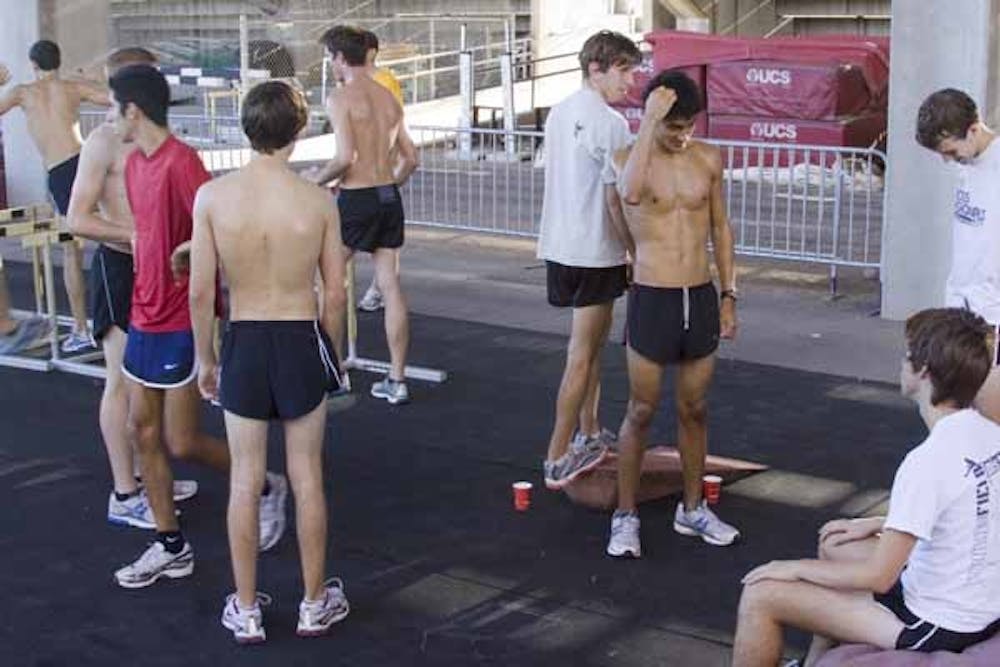PREPPED TO WIN: The ASU men's cross country team works out at practice last week in preparation for the Dave Murray Invitational. The men's team took first place in the event over the weekend while the women placed second. (Photo by Annie Wechter)