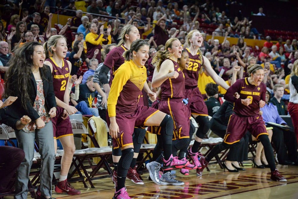 The ASU Sun Devil bench erupts with joy as they pull ahead during an anxious last minute of Friday night's game. The tense seconds ticked by slowly before the Sun Devils would pull ahead with about 45 seconds to go, winning their twenty-fifth victory of the season 45-42 over the Utes on Feb. 27, 2015 at the Wells Fargo Arena in Tempe. (J. Bauer-Leffler/The State Press)