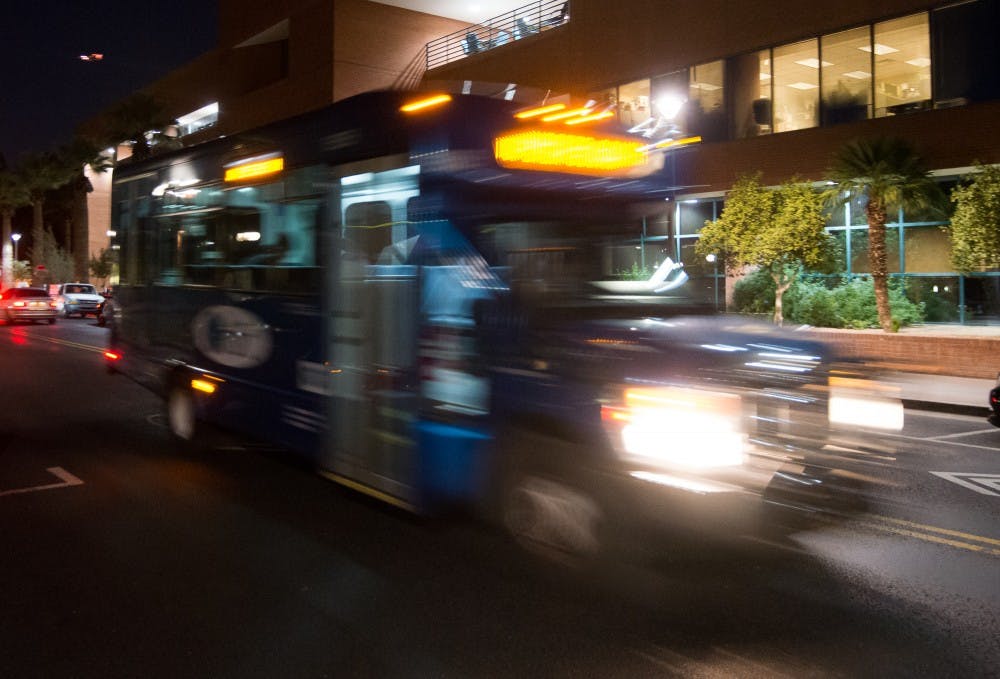 In this photo taken with a slow shutter speed, an Orbit circulator bus drives down Forest Avenue on Wednesday, Jan. 20, 2016, on the Tempe campus.