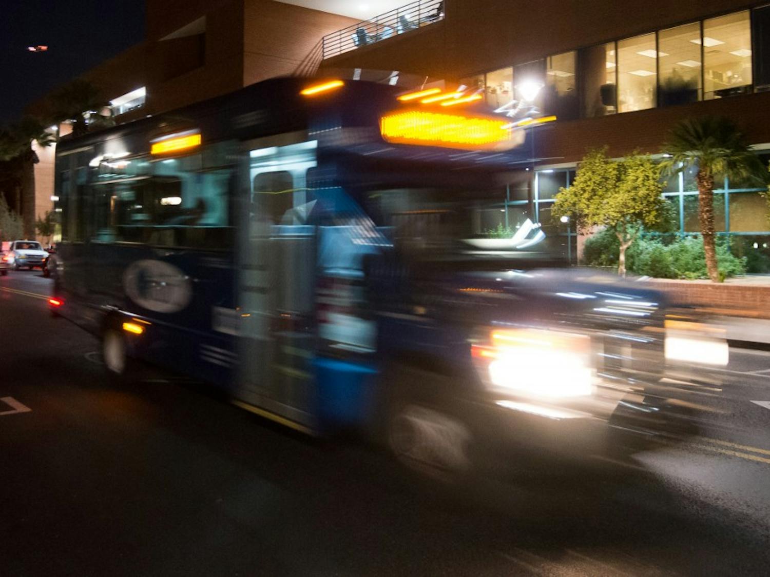 In this photo taken with a slow shutter speed, an Orbit circulator bus drives down Forest Avenue on Wednesday, Jan. 20, 2016, on the Tempe campus.