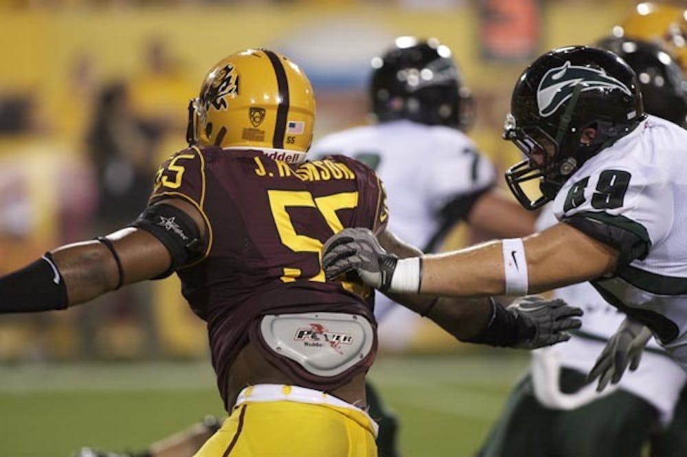 LONG TIME COMING: ASU redshirt senior defensve end Jamarr Robinson attempts to get past Portland State sophomore offensive lineman Kyle Ritt during last Saturday's game. (Photo by Scott Stuk)