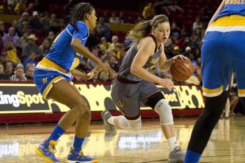 ASU senior forward Sophie Brunner (21) drives towards the basket during a women's basketball game against the no. 15 ranked UCLA Bruins in Wells Fargo Arena in Tempe, Arizona on Sunday, Feb. 26, 2017. ASU lost 55-52.  (Josh Orcutt/State Press)