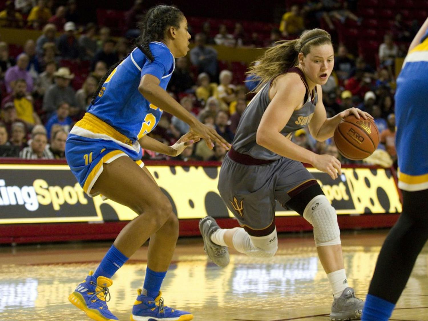 ASU senior forward Sophie Brunner (21) drives towards the basket during a women's basketball game against the no. 15 ranked UCLA Bruins in Wells Fargo Arena in Tempe, Arizona on Sunday, Feb. 26, 2017. ASU lost 55-52.  (Josh Orcutt/State Press)