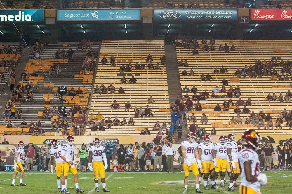 Fans file out of the lower-level bleachers at Sun Devil Stadium during a game against USC on Saturday, Sept. 26, 2015, in Tempe. The Trojans defeated the Sun Devils 42-14.