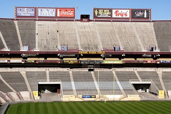 ASU workers are removing the North end section of seats of Sun Devil Stadium on Wednesday, Jan. 15. (Photo by Mario Mendez)