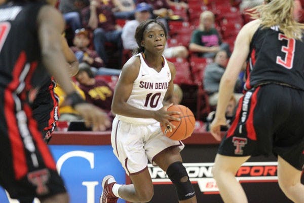 Sophomore guard Promise Amukamara gets set to pass the ball during the Sun Devils’ 61-49 loss to Texas Tech last Sunday. (Photo by Kyle Newman)