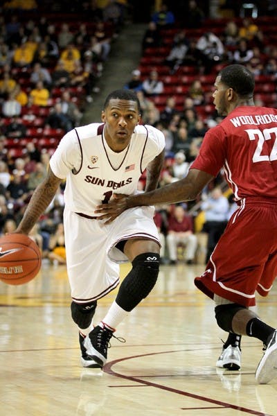 Redshirt freshman guard Jahii Carson penetrates the lane against Washington State on Feb. 20. Carson has decided to stay at Tempe next year. (Photo by Sam Rosenbaum)