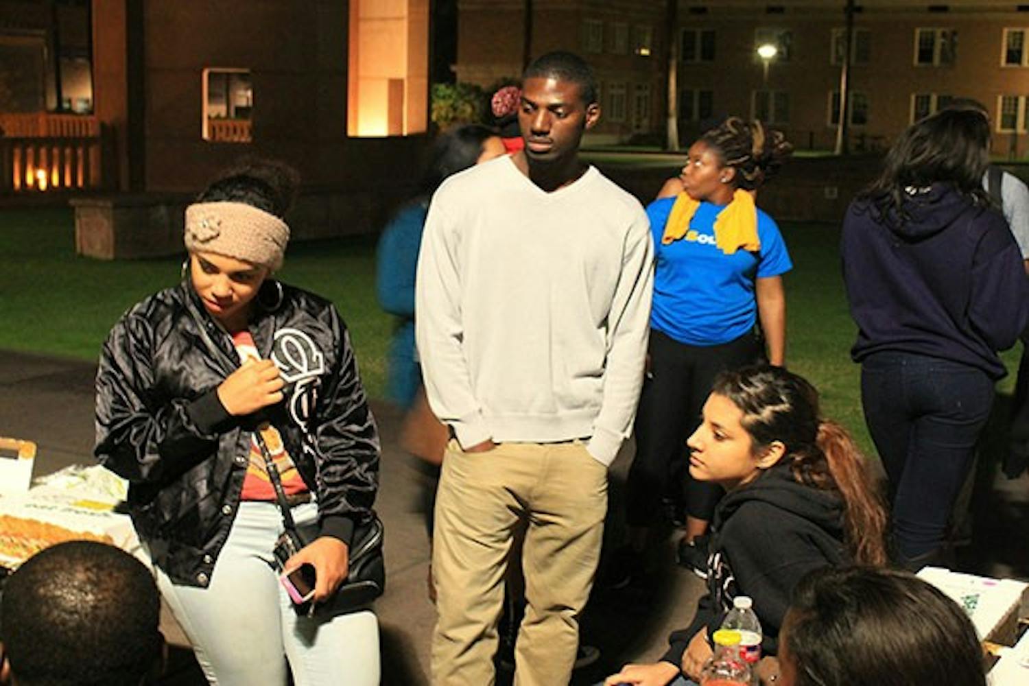 Members of Phi Beta Sigma sleeping outside in recognition of homeless awareness week Nov 8th at the Hayden lawn in tempe campus.