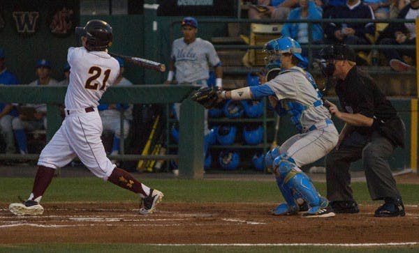 Sophomore outfielder Jake Peevyhouse takes a swing during the Sun Devils' 4-1 victory over No. 4 UCLA Friday. Peevyhouse had a catch over the left field wall that sealed ASU's first win of the series. (Photo by Dominic Valente)