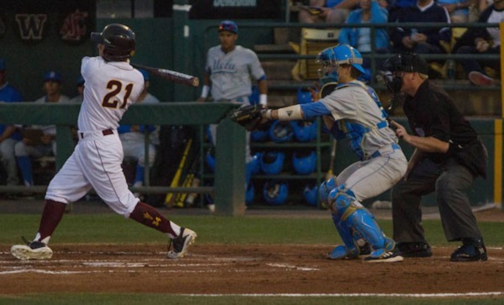 Sophomore outfielder Jake Peevyhouse takes a swing during the Sun Devils' 4-1 victory over No. 4 UCLA Friday. Peevyhouse had a catch over the left field wall that sealed ASU's first win of the series. (Photo by Dominic Valente)