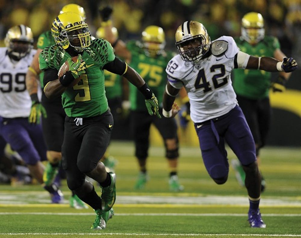 Byron Marshall ran for 60 yards and a touchdown during Oregon's 52-21 victory over Washington. (Alex McDougall/Emerald)