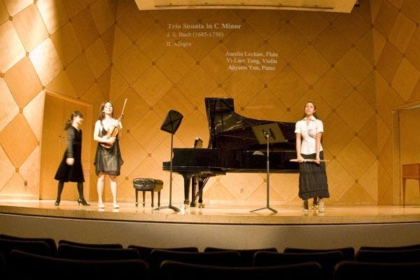 PERFECT HARMONY: Music students of the Herberger Institute for Design and the Arts perform in a choral ensemble Wednesday night. (Photo by Annie Wechter)