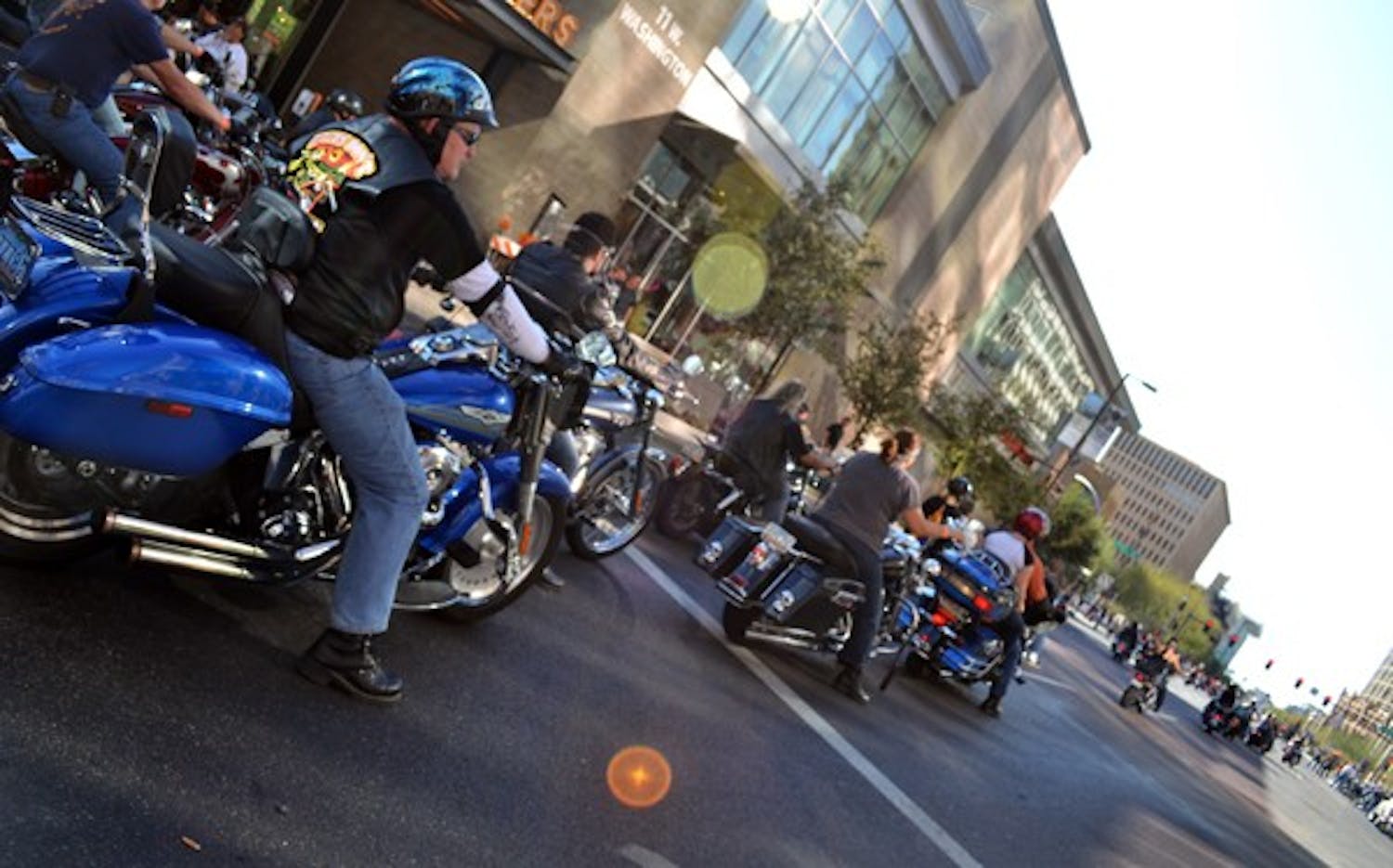 Motorcyclists stop at a light blocks away from the finish line of the Arizona Centennial Ride Saturday afternoon in downtown Phoenix. (Photo by Brittany Lea)