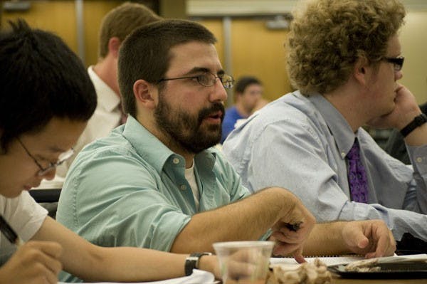 SMOKING BAN: Sen. Daniel Valenza, committee chair of University affairs, helps to clarify language on Senate Bill 64, concerning smoking on campus. (Photo by Molly Smith)