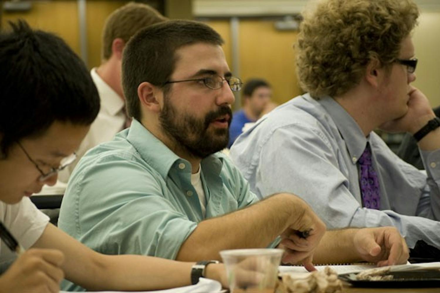 SMOKING BAN: Sen. Daniel Valenza, committee chair of University affairs, helps to clarify language on Senate Bill 64, concerning smoking on campus. (Photo by Molly Smith)