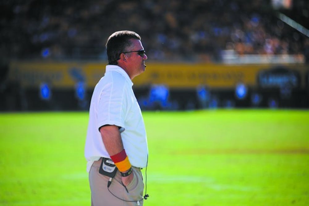 Football head coach Todd Graham observes the action on the field during the Sun Devils’ 45-43 loss to UCLA on Saturday. (Photo by Aaron Lavinsky)