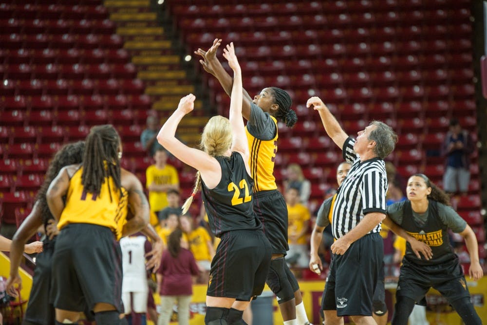 Junior center Quinn Dornstauder (22) and freshman center Charnea Johnson-Chapman (33) face off at the beginning of the overtime period during the women's intra-squad scrimmage on Friday, Oct. 9, 2015, at Wells Fargo Arena in Tempe.