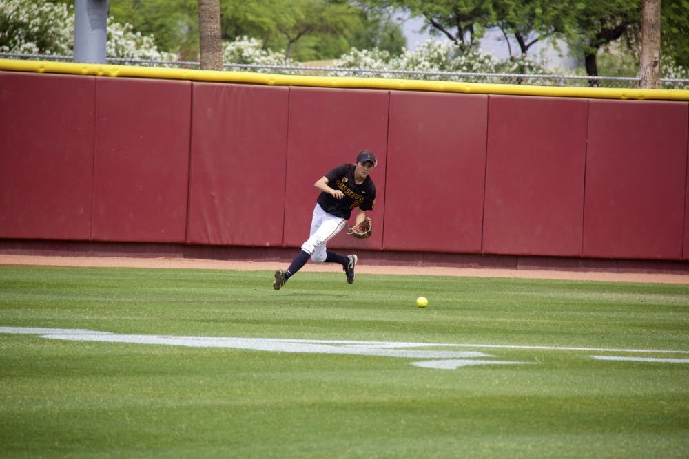 Senior outfielder Bailey Wigness runs for a ball hit by the Michigan Wolverines during game one of the NCAA Tempe Regional Championships on Sunday, May 18, at Farrington Stadium. ASU lost to Michigan 3-4. (Photo by Becca Smouse)