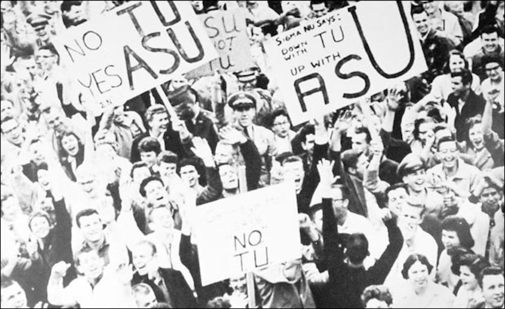 Students rally to change the name of Arizona State College to Arizona State University in 1958. (University Archives Photograph/ASU Archives) 