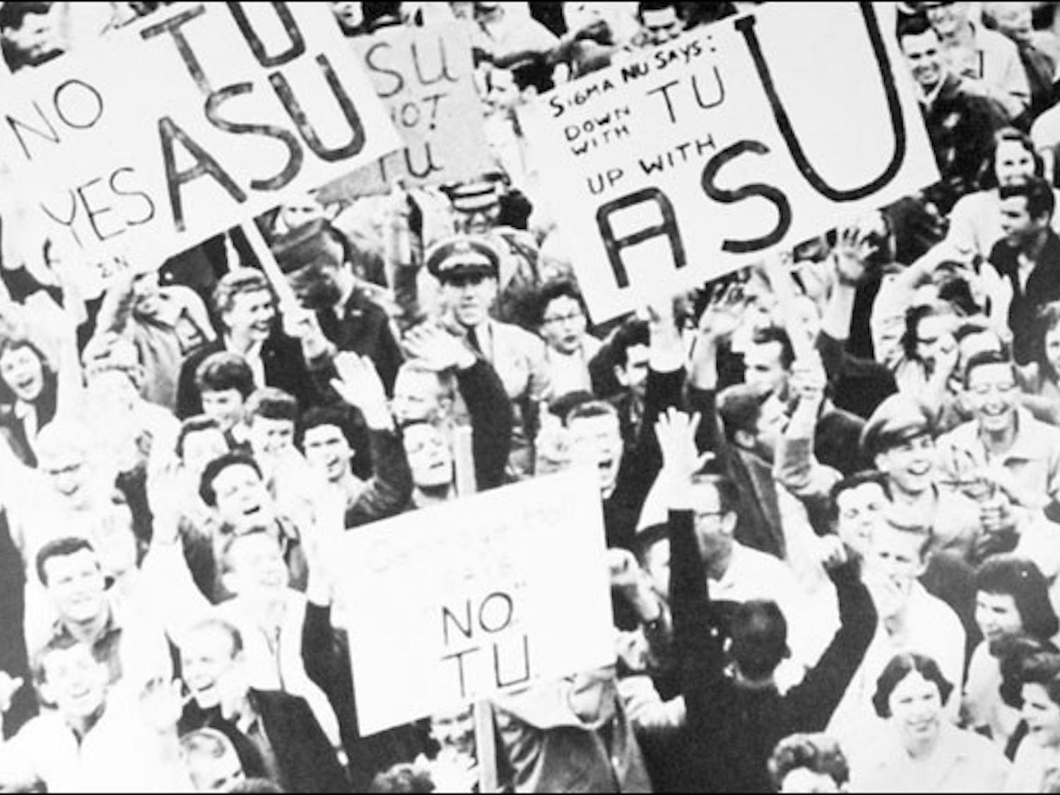 Students rally to change the name of Arizona State College to Arizona State University in 1958. (University Archives Photograph/ASU Archives) 