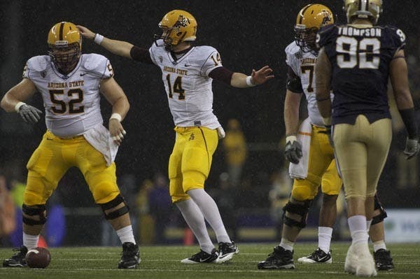 UPHILL CLIMB: Junior receiver Mike Willie raises his arms in frustration Oct. 9 against Washington. To get eligible for a bowl game, Willie and the Sun Devils will have to win four of their last five games, three of which come against ranked opponents. (Photo by Scott Stuk)