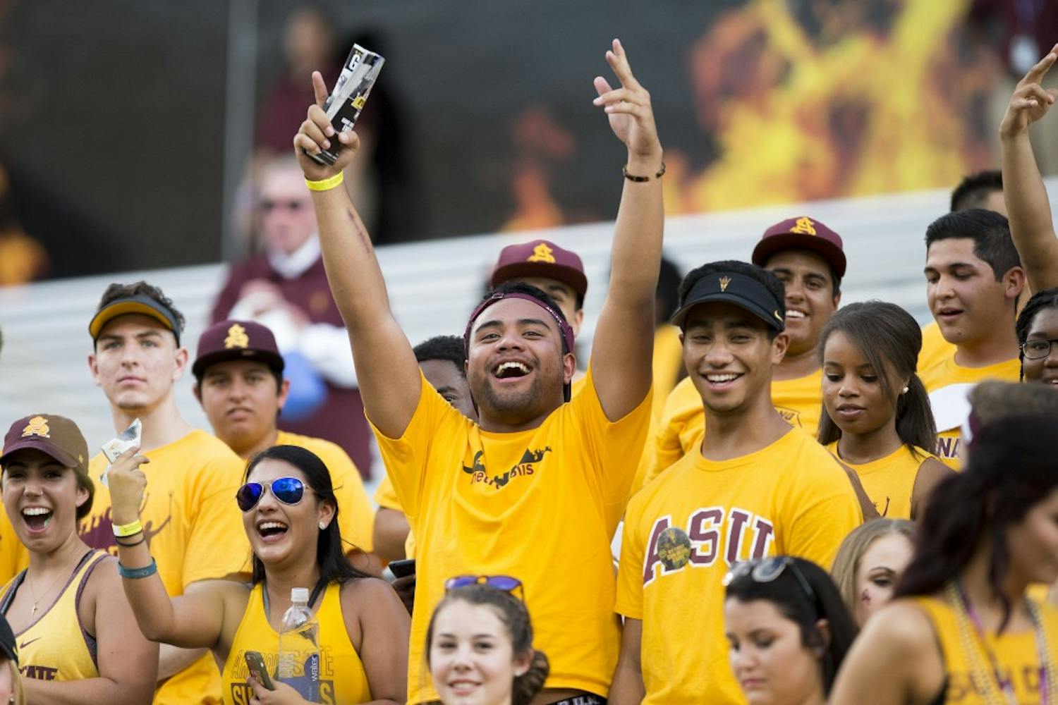 ASU students flood into the south Inferno section before the Sun Devil football squad kicks off on Sept. 12., 2015. 