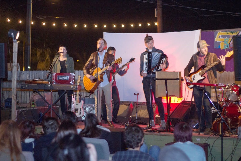 The band Longbird led by siblings Mariah and Bobby Brown performing on  Jan 22, 2015. Longbird was one of the bands that performed during the poetry slam hosted by Lawn Gnome Publishing. (Jonathan Galan/ The State Press)