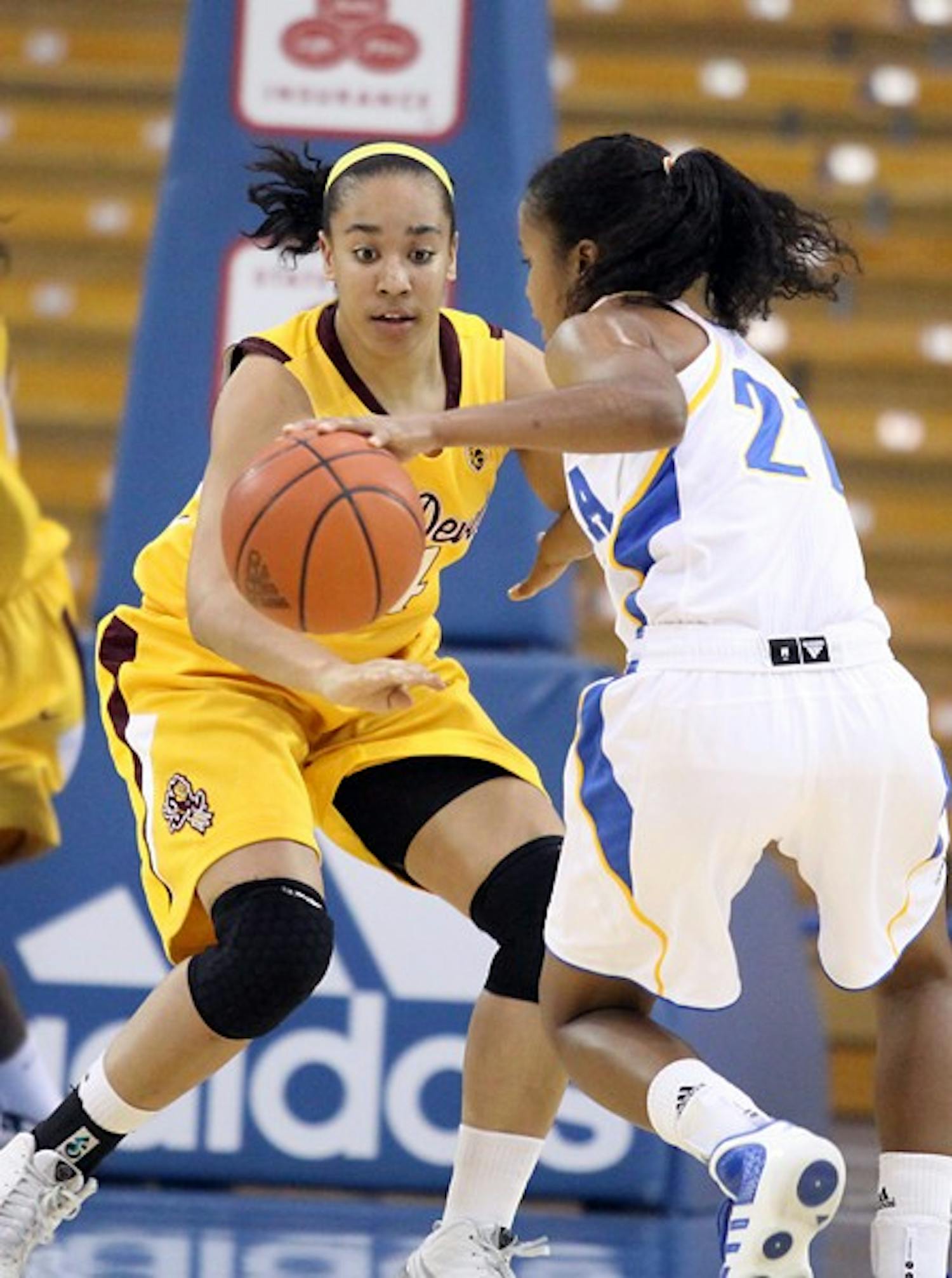 Defensive Trap: ASU freshman guard Adrianne Thomas attempts to defend UCLA senior guard Doreena Campbell during the Sun Devils’ 70-60 loss to the Bruins Thursday night in Los Angeles. (Photo courtesy of Steve Rodriguez)