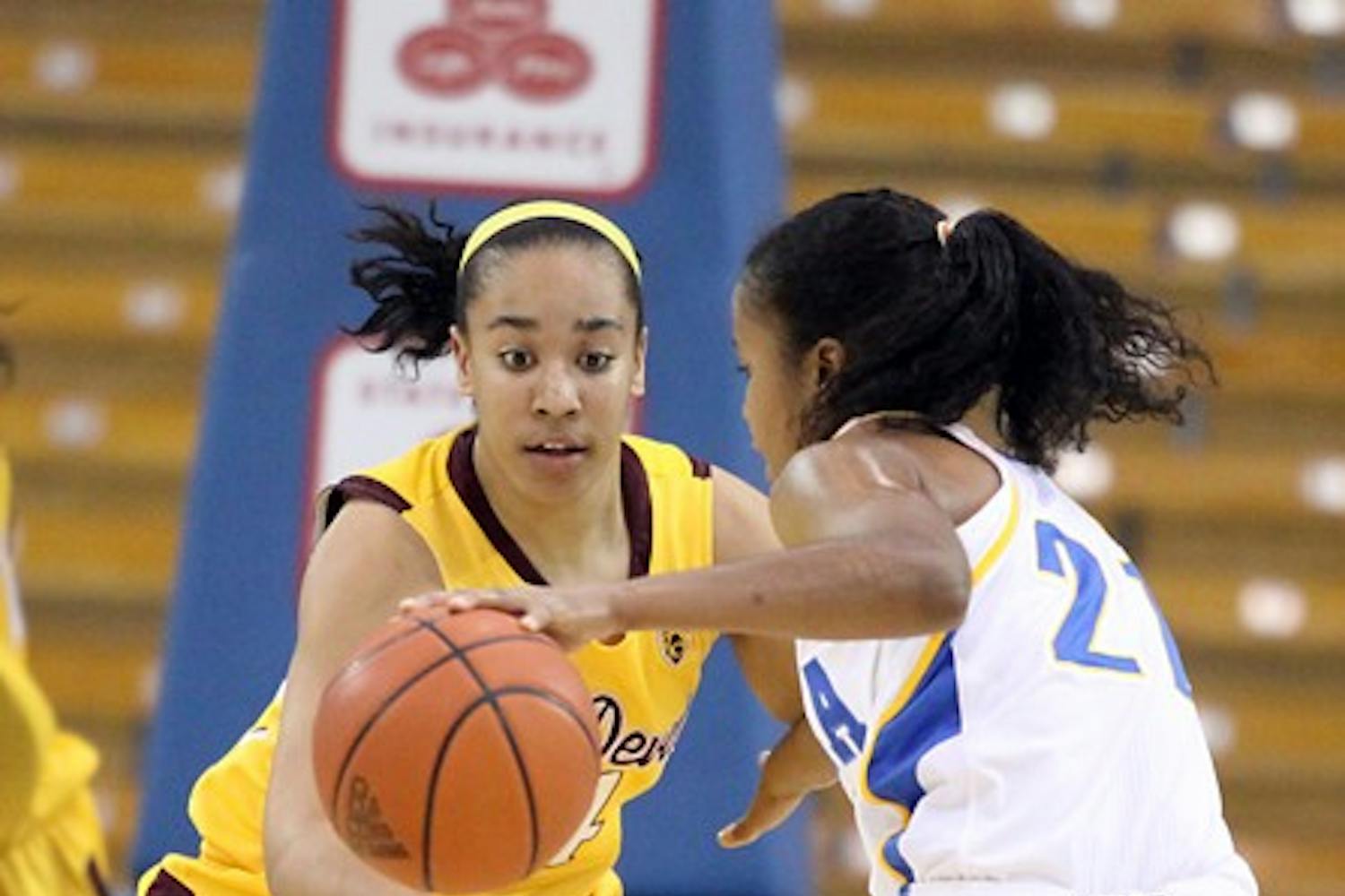 Defensive Trap: ASU freshman guard Adrianne Thomas attempts to defend UCLA senior guard Doreena Campbell during the Sun Devils’ 70-60 loss to the Bruins Thursday night in Los Angeles. (Photo courtesy of Steve Rodriguez)