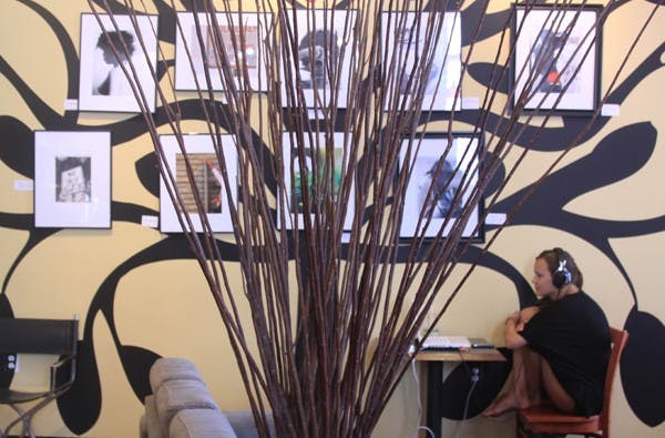 COFFEE BREAK: Human nutrition senior Michelle Whitman hangs out at One Coffee Co. on Central Avenue and Washington Street in downtown Phoenix Monday evening. (Photo by Lillian Reid)