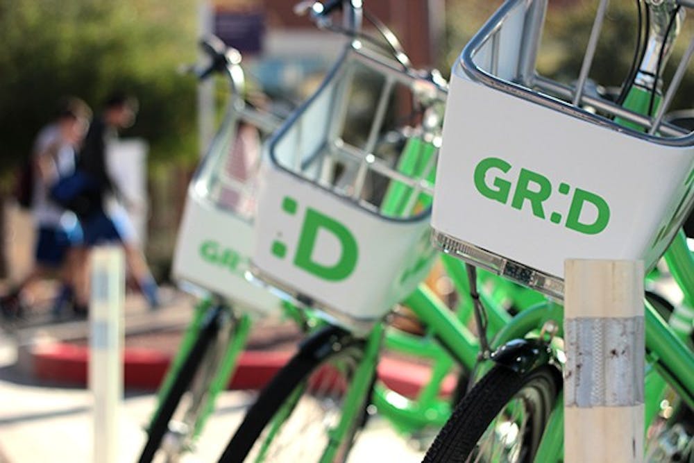 The city of Phoenix is testing its new bike-sharing program at three locations in downtown Phoenix, including a location across from the Walter Cronkite School of Journalism and Mass Communication. The city will be testing the program until late January or early February. (Photo by Alexis Macklin)