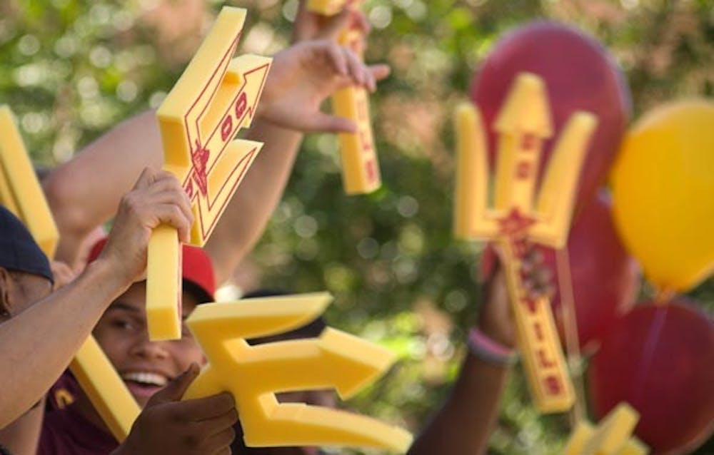 SHOW YOUR SPIRIT: Students at a pep rally on the Tempe campus show their spirit for Sun Devils football. ASU’s Game Day Initiative has proven to be affective, with more fans crowding the stands on game day. (Photo by Aaron Lavinksy)