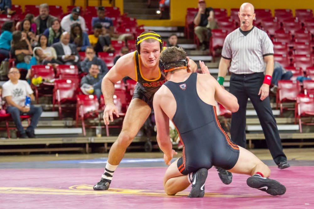 Redshirt senior Blake Stauffer faces off against Corey Griego from Oregon State on Friday, Jan. 29, 2016 at the Wells Fargo Arena in Tempe.