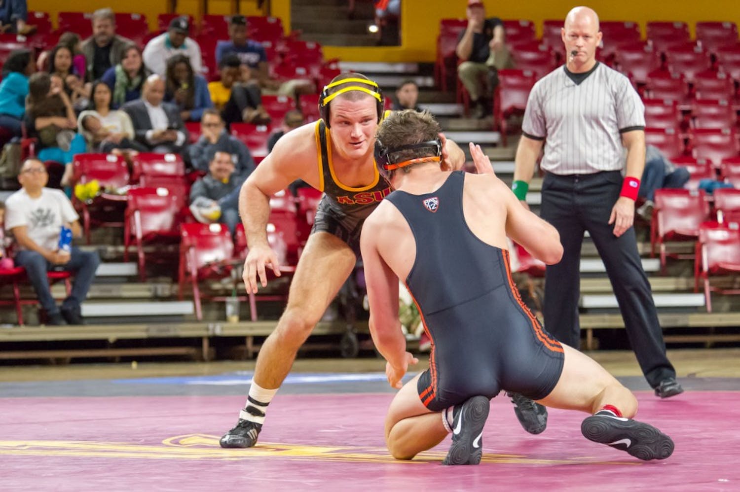 Redshirt senior Blake Stauffer faces off against Corey Griego from Oregon State on Friday, Jan. 29, 2016 at the Wells Fargo Arena in Tempe.