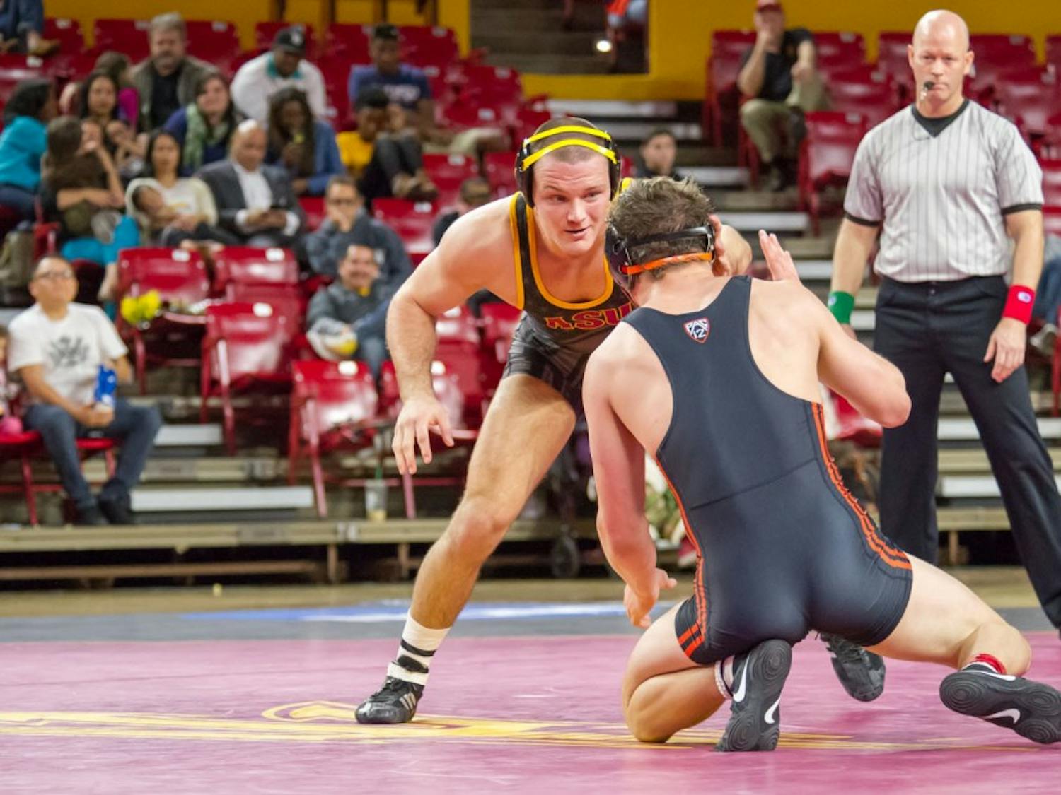 Redshirt senior Blake Stauffer faces off against Corey Griego from Oregon State on Friday, Jan. 29, 2016 at the Wells Fargo Arena in Tempe.