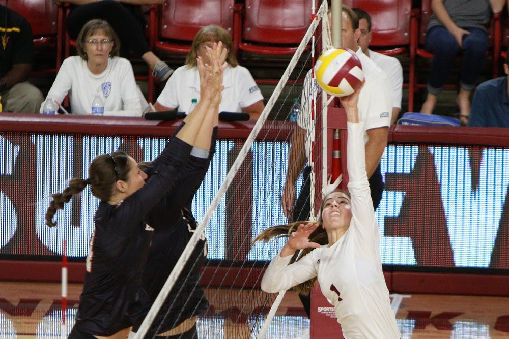Senior setter Bianca Arellano attempts a spike in the first set against Oregon State on Sunday, Sept. 27, 2015 at Wells Fargo Arena in Tempe. The Sun Devils defeated the Beavers three games to none to improve to 13-0 on the season (25-18, 25-19, 25-20).