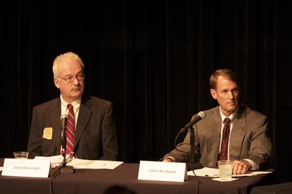 CLEAN ELECTION: John Kavanagh (left) and John Kriekard (right) debate Tuesday night as they battle in the polls for the House of Representative position in District 8. (Photo by Scott Stuk)