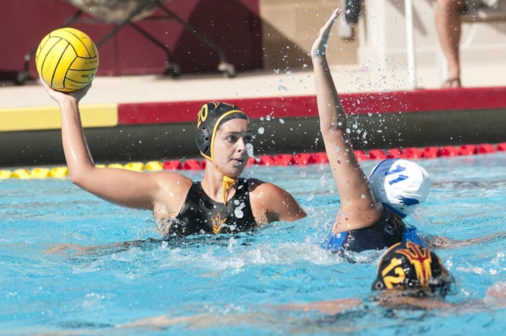 Senior attacker Kate Enoka (ball) surveys the water during the Sun Devils' 12-3 win over Hartwick on March 25. ASU heads into the MPSF tournament with its first NCAA tournament bid on the line. (Photo by Molly J. Smith)
