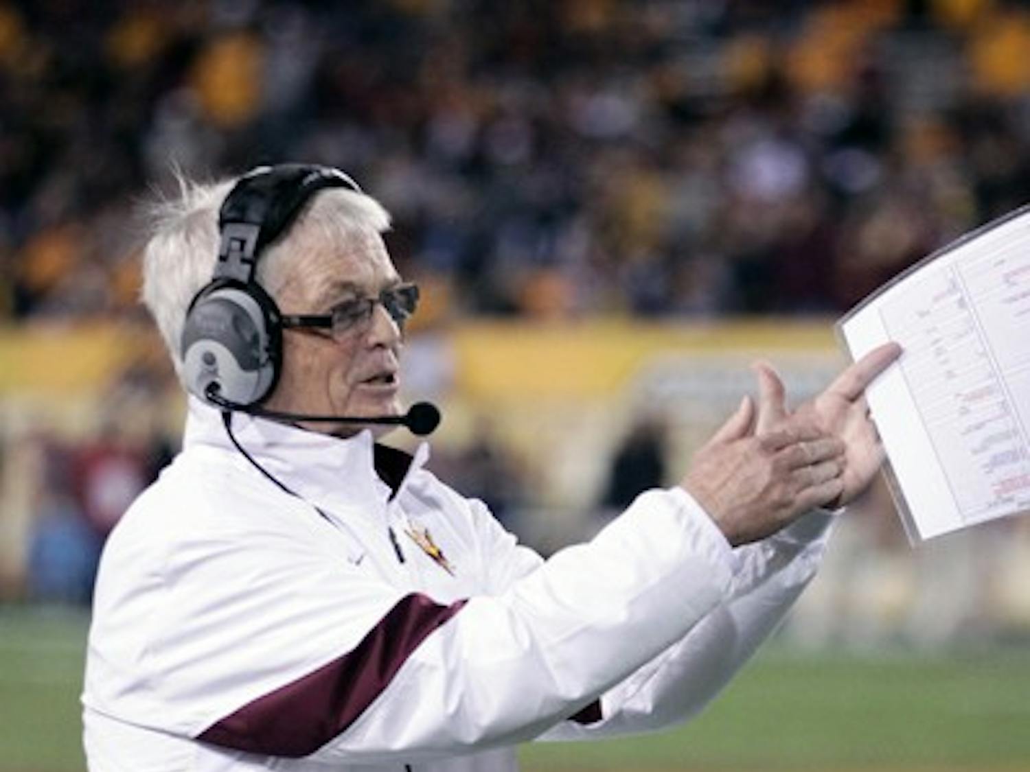 Football coach Dennis Erickson applauds on the sidelines during the Sun Devils 47-38 loss to California on Friday. Erickson said he would meet with athletic director Lisa Love sometime over the week to discuss his future with the team. (Photo by Beth Easterbrook)