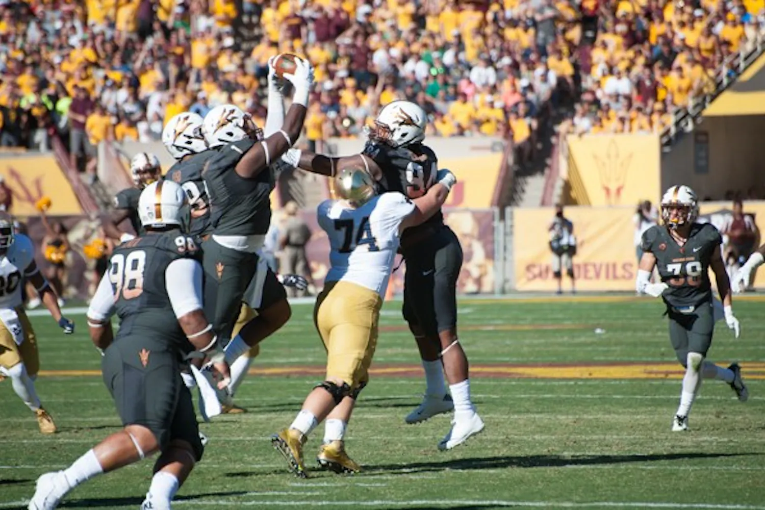 , Saturday, Nov. 8, 2014 at Sun Devil Stadium in Tempe. (Photo by Ben Moffat)