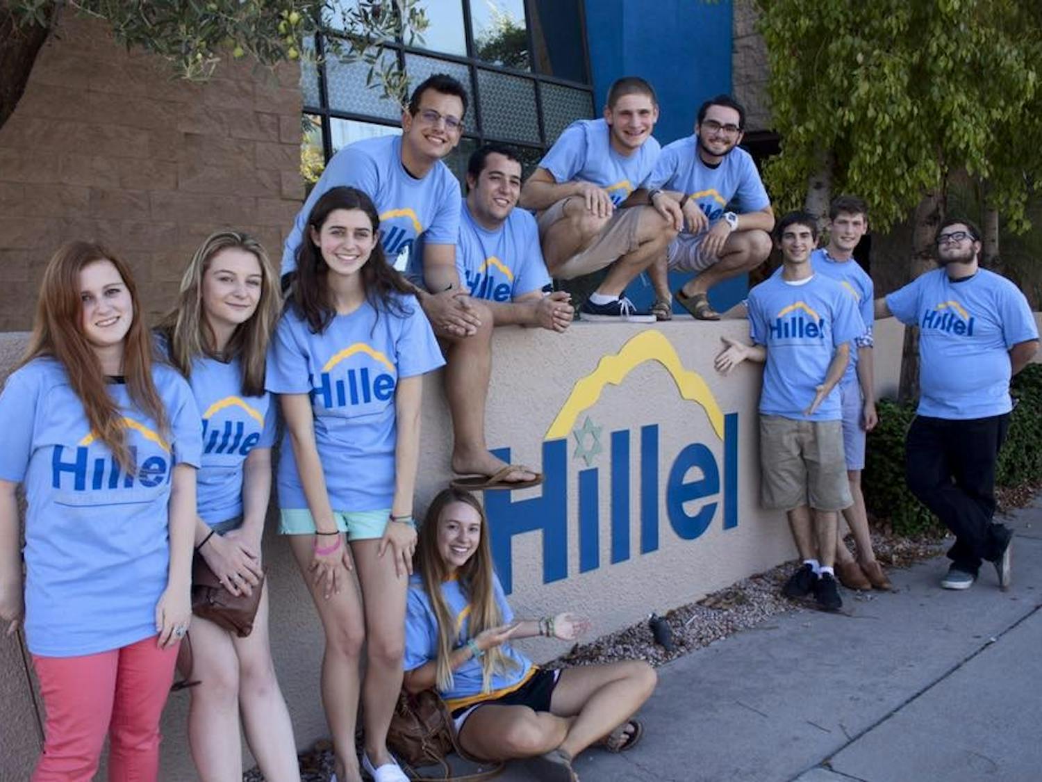 Students pose for a photo&nbsp;outside of Hillel together.