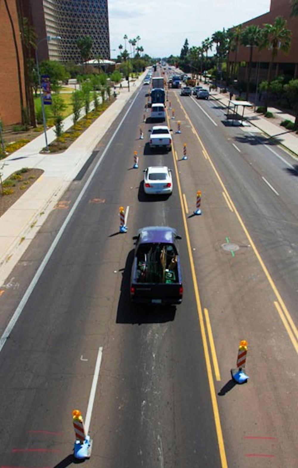 Construction on University Drive and McAllister on ASU's Tempe campus has the road down to only one lane in each direction. Construction is projected continue till the end of (Photo by Dominic Valente)