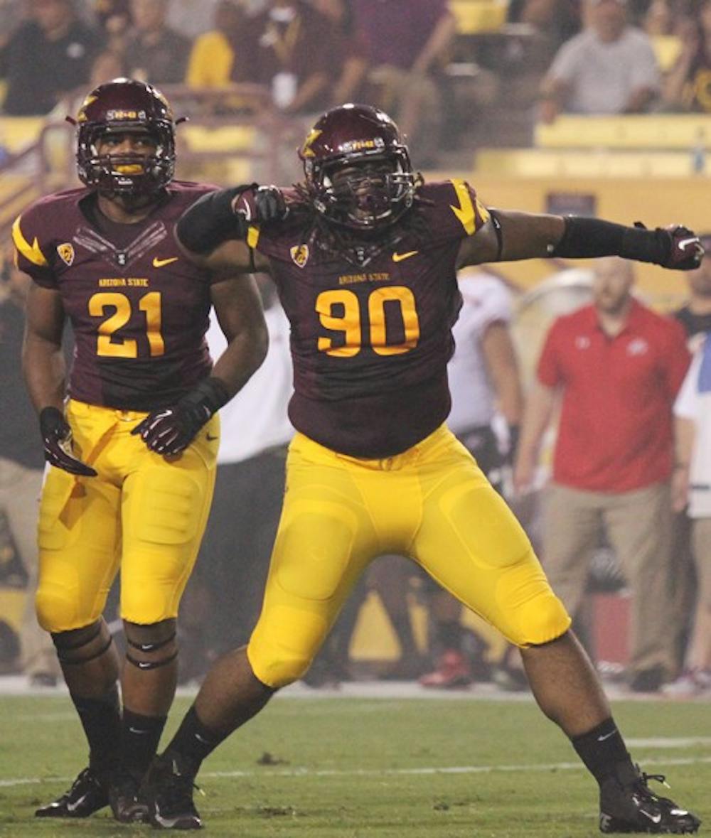 Redshirt junior defensive tackle Will Sutton celebrates after a play during the Sun Devils’ 37-7 win over Utah on Sept. 22. (Photo by Kyle Newman)